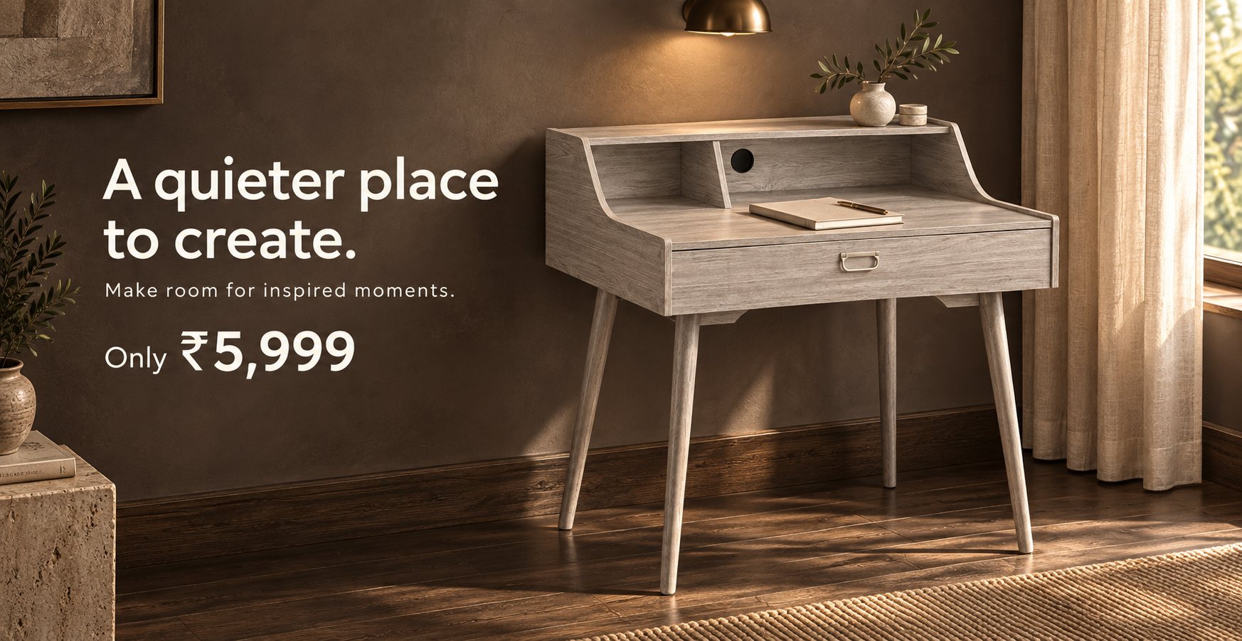 A grey writing desk with a hutch shelf and tapered legs in a warm, lamp-lit study